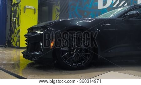Tomsk, Russia - March 30, 2020: Chevrolet Camaro Zl1 The Exorcist With High Pressure Washer Side Vie
