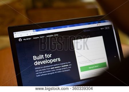 New York, Usa - 9 April 2020: Github Website On Laptop Screen Close Up. Man Using Service On Display