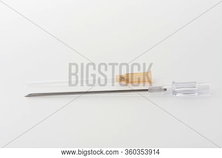 Orange Intravenous Cannula 14 G On White Background, External Diameter 2,1 Mm, Used In Trauma, Blood