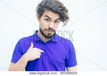 Surprised Guy Pointing Finger At Himself With Questioning Face. Handsome Bearded Young Man In Blue C