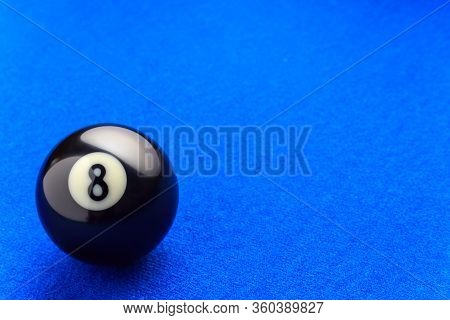 Eight Billiard Ball In A Blue Pool Table.