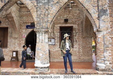 Travelers Thai Women Travel Visit And Respect Praying To Allah In Krue Se Mosque Or Masjid Kerisek A