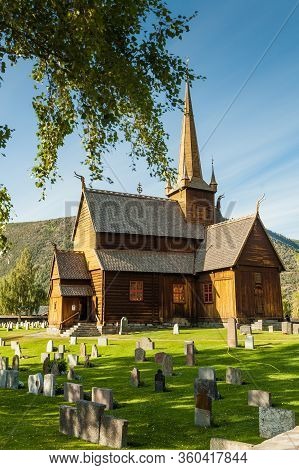 Lom, Norway - July 7, 2018: Graveyard With Old Tombstones Around Lom Stave Church In Oppland County,