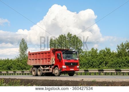 Ufa, Russia - June 4, 2008: Red Dump Truck Cnhtc Howo At The Interurban Road.