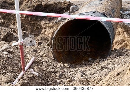 repair and replacement main pipeline of heating systems, district heating pipes network, water supply or Sewerage in city, removing old pipes and replacing them with new ones in a hole in the ground