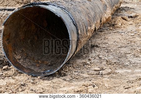 repair and replacement main pipeline of heating systems, district heating pipes network, water supply or Sewerage in city, removing old pipes and replacing them with new ones in a hole in the ground