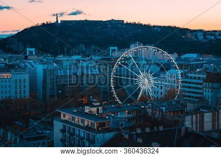 Budapest Ferris Wheel At Elisabeth Square At Winter Time After Sunset. Hungary