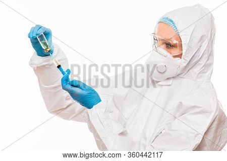 Doctor, Nurse Or Scientist Hand In Blue Nitrile Gloves Holding Flu, Measles, Coronavirus Covid-19 Va