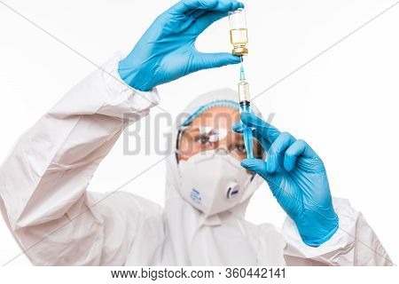 Doctor, Nurse Or Scientist Hand In Blue Nitrile Gloves Holding Flu, Measles, Coronavirus Covid-19 Va