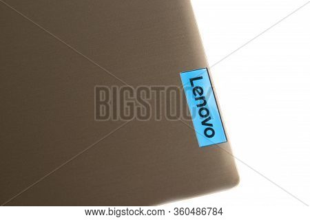 Back Side Of Laptop With Lenovo Logo Isolated On White Background.