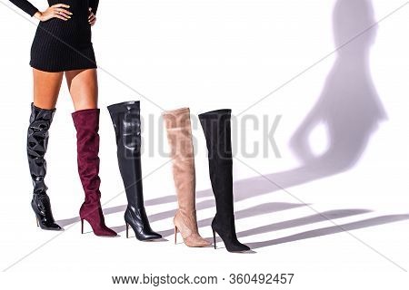 Black Hessian Boots On The Legs Of The Model On A White Background With Shadows And Other Hessian Sh