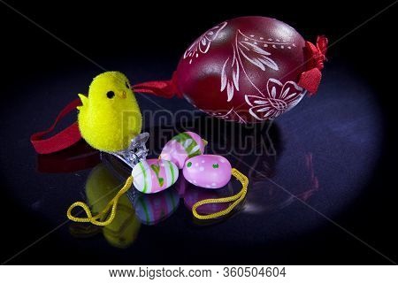 Easter Eggs On A Black Background With Spot Light