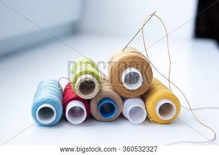 Babin Sewing Thread On A White Isolated Background