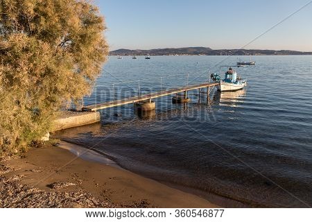 Boat In A Small Pier In Adamas Village, Milos, Greece