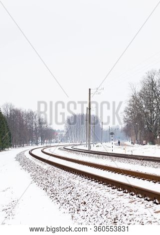 Sigulda, Latvia - January 31:  The View Along A Snow Covered Railway Track In Sigulda, Latvia Pictur