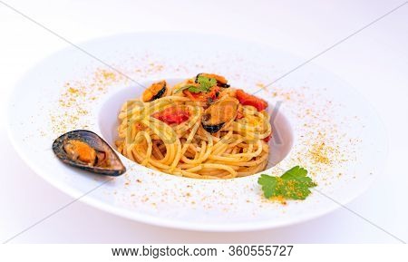 Spaghetti With Mussels Bottarga Fish And Cherry Tomatoes
