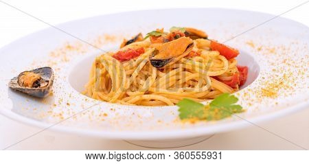 Spaghetti With Mussels Bottarga Fish And Cherry Tomatoes