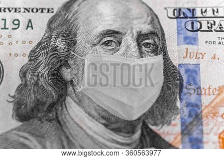 Photo Illustration Of Ben Franklin In A Mask On A Dollar 100 Bill. Displays Problems In The World An