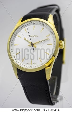 Biel, Switzerland 31.03.2020 - The Closeup Of Calvin Klein Man Gold Pvd Coating White Clock Face Dia