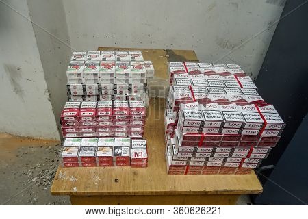 Krakovets, Ukraine - May, 2019: Smuggled Cigarettes Extracted From A Specially Equipped Cache In A V