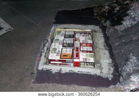 Krakovets, Ukraine - January, 2014: Smuggled Cigarettes Hidden In The Body And Passenger Compartment