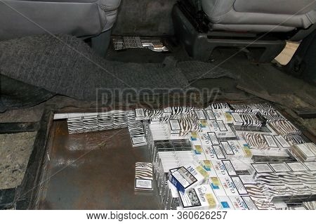 Krakovets, Ukraine - January, 2014: Smuggled Cigarettes Hidden In The Body And Passenger Compartment
