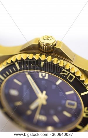 Ibach, Switzerland 31.03.2020 - The Close Up Of Victorinox Man Watch Stainless Steel Case Gold Pvd C