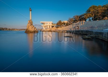 Monument To The Scuttled Ships At Sunset. Sevastopol, Russia. Long Exposure, Smooth Sea