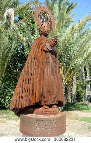 Elche, Spain - September 20, 2018:sculpture Of A Clergyman At A Municipal Park In The City Of Elche.