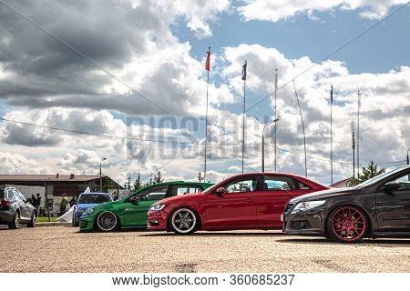 Moscow, Russia - July 6, 2019: Green Golf And Gray Passat Volkswagen And Red Audi A4 - Sports Cars A