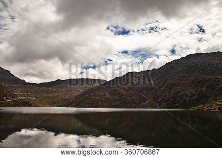Tsomgo Lake, Also Called Changu Lake Surrounded By Stony Hills And Roads In Autumn Season. A Sacred 