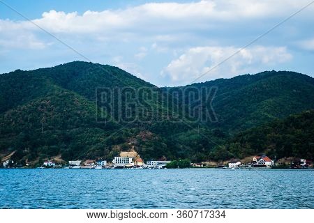 The Romanian Shore Seen From A Boat, Danube River. Dubova Golf, Cazanele Dunarii. Romania.
