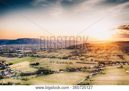 Vienna, Austria. Romantic Aerial View To Bisamberg And Kahlenberg During Sunset.