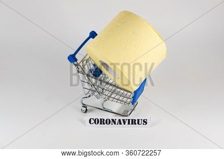Consumer Buying Panic About Coronavirus Covid-19 Concept. Toilet Paper Roll In Shopping Trolley With