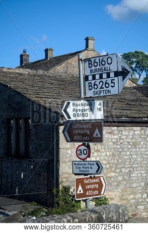 Signpost At A Village Crossroads In Kettlewell In The North Yorkshire Dales