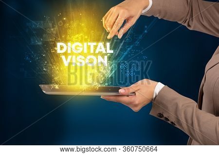 Close-up of a touchscreen with DIGITAL VISON inscription, innovative technology concept
