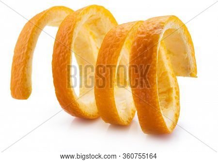 Orange peel or orange twist on white background. Close-up.