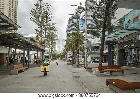 Surfers Paradise, Australia - April 8, 2020: Coronavirus Standby Paramedic Ambulance On Bikes Ride T
