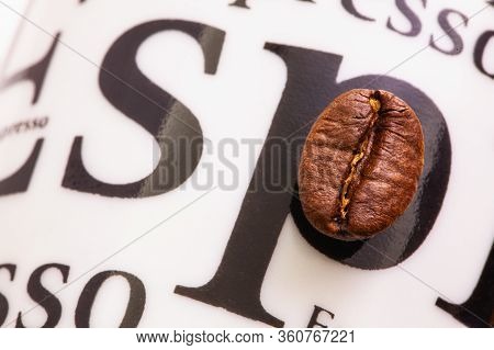 Detail Of Coffee Bean On Porcelain Coffee Cup. Coffee Design.