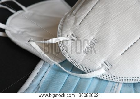 White Kn95 Or N95 Mask With Antiviral Medical Mask For Protection Against Coronavirus On Black Backg