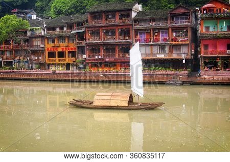 Fenghuang, China.  September 13, 2015.  Guest Houses And Restaurants Lining The Tuojiang River Throu