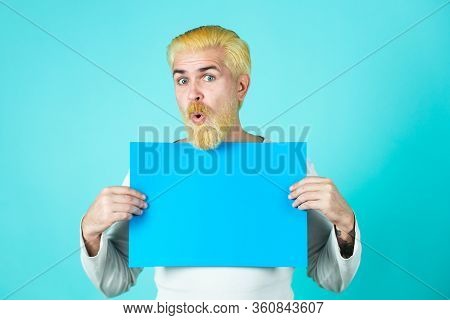 Excited Funny Man Holding Empty White Board. Advertising. Copy Space On Paper. Man Holding A Blank B