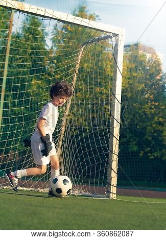 Summer Soccer Tournament For Young Kids. Football Club. Emotions And Joy Of The Game. Young Goalie. 