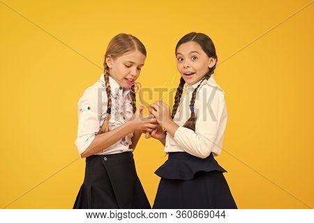 Vitamin C Is Crucial For The Growth. Little Girls Drinking Vitamin Juice From Orange Fruits On Yello