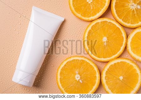 Cream With Vitamin C Branding Concept. Top Above Overhead Close Up Flatlay View Photo Of Big Tube Wi