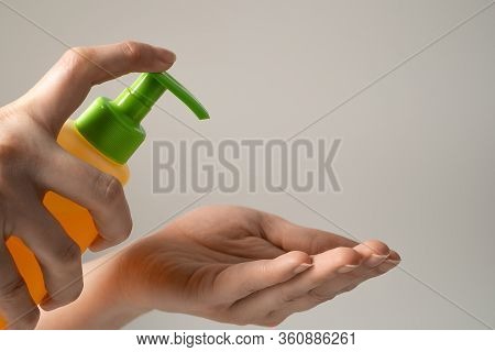 Hand Disinfection With Gel And Alcohol. The Spray Is Used To Clean Hands And Destroy Germs, Bacteria