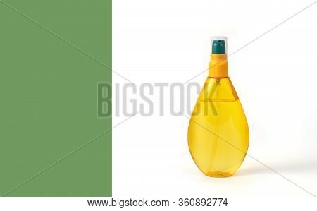 Transparent Orange Bottle On A White Background That Can Be Used For Storing: Alcohol Solutions To P