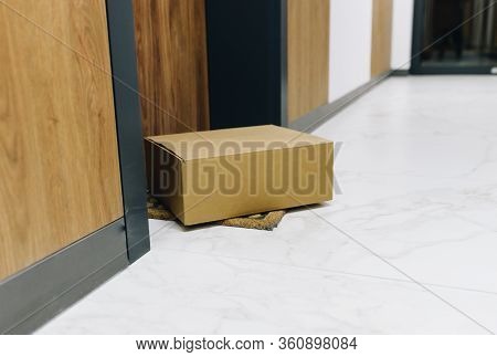 Parcel Box Ordered Online Delivered Via Contactless Delivery On Doormat In Front Of Front Door Durin
