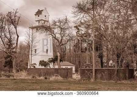 A Sepia Toned View Of The Historic Stucile Farm Water Tower In Joe Palaia Park In Ocean New Jersey.