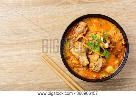Traditional Northern Thai Food (khao Soi), Spicy Curry Noodles Soup With Coconut Milk And Chicken In